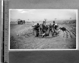 Students of Harwood Bible Training School fixing a rural road, Fenyang, Shanxi, China, 1937