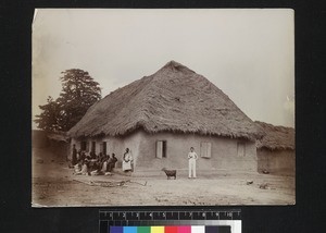 Missionary and villagers outise house, Lagos, ca. 1895-1891