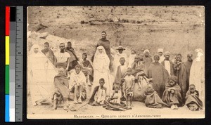 Missionary sisters standing among lepers, Madagascar, ca.1920-1940