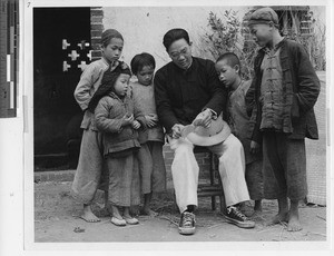 The Catholic faith is explained to children at Wuzhou, China, 1948