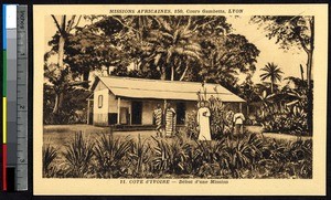 Missionary father with indigenous men at a new mission, Ivory Coast, ca.1900-1930