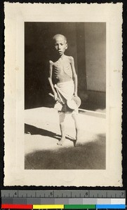 Starving child with empty bowl, Shaoxing, Zhejiang, China, ca.1930-1940