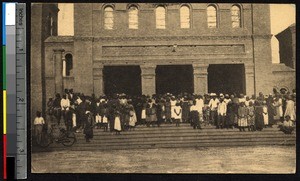 Indigenous men and women leaving church, Lubumbashi, Congo, ca.1900-1930