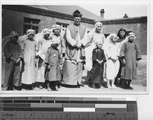 Fr. Lane with First Communicants at Fushun, China, 1933