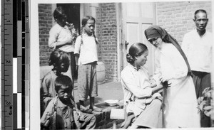 Patients being treated at dispensary, Fushun, China, ca. 1930