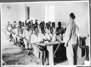 Missionary Guth giving religious instruction to a class, Gonja, Tanzania, ca.1927-1938