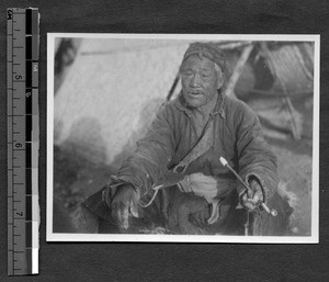 Famine refugee near campus of Shantung Christian University, Jinan, Shandong, China, 1927