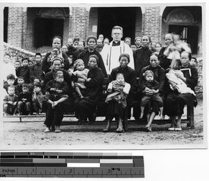 Fr. Robert J. Cairns, MM, at a baptism ceremony, Xinchang, China, 1927