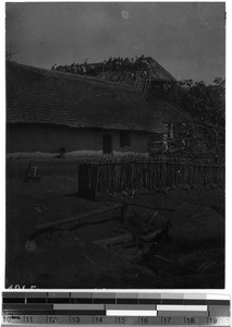 House construction. The binding of Magito on the roof-framework, Tanzania