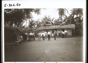 Missionaries in front of the teacher's house in Ndogosimbi near Bonaku - photograph taken after the baptismal service