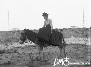 Miss Perrenoud on donkey, Matutwini, Mozambique, ca. 1896-1911
