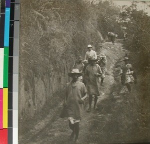 Anders Antonio Olsen in a carrying chair on his way to a conference, Madagascar, ca.1910