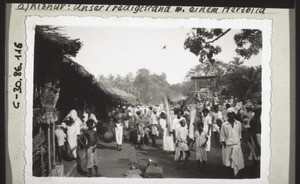 Market in Kizhur. At the rear on the right the stone altar on which in the evening the picture of a deity is exhibited