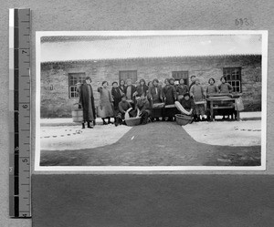 Washing skeins of yarn at Harwood Bible Training School, Fenyang, Shanxi, China, ca.1936-37