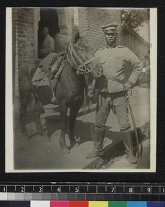 Imperialist cavalryman with horse, Xiaogan, China, ca. 1911