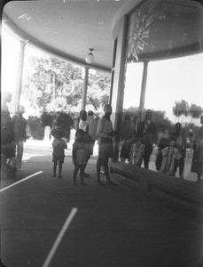 African people standing in front of a store, Maputo, Mozambique