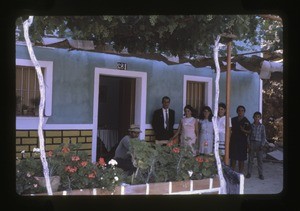 Family outside their home