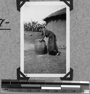 Woman with beer barrel, South Africa East