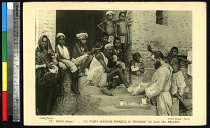 French Capuchin Father caring for a patient, Ajmer, India, ca.1920-1940