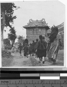 Walking a group of school children, Yeung Kong, China, ca. 1923