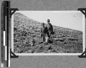 Two children with pot, Mvenyane, South Africa East, 1933