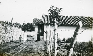 Peruvian Inland Mission missionary with child, Peru, ca. 1947