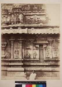 Man in front of temple with dog, Hampi, India, ca. 1880-1890