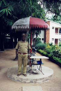 Tamil Nadu, South India. Watchman in front of the Women Students Christian Hostel (WSCH) in Che