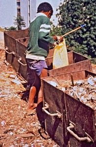 Mission at the bottom - City Mission in Madagascar. Looking for food. Photo 1997