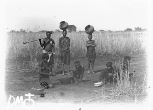 African women collecting salt, Antioka, Mozambique, ca. 1896-1911