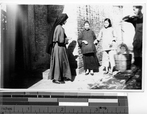 A Maryknoll Sister on a home visit at Guilin, China, 1949