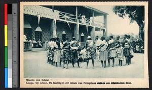 Students dance outside of a school, Hemptinne St. Benoit, Congo, ca.1920-1940