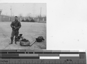 A father and son seek assistance at the Fushun Mission, China, 1934