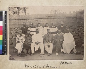 Group portrait of missionary with indigenous preachers and deacons, Madagascar, ca. 1895