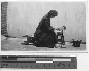 Sister making altar breads at Jiangmen, China, 1937