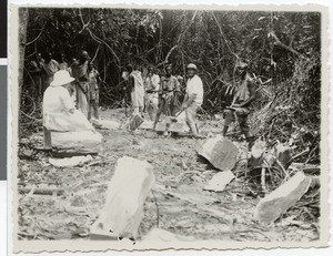 Splitting wood in the forest near Birbir River, Ethiopia