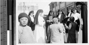 Maryknoll Sisters with children, Shanghai, China, ca. 1925-1945