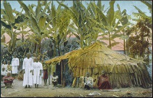 Africans in front of a hut, Tanzania, ca. 1900-1914