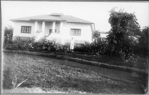 Mrs. Rohde(?) in front of a European house, Boloti, Tanzania