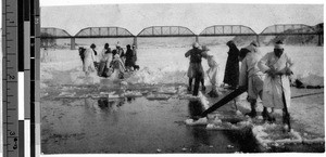 Men breaking ice on the Yalu River, Gishu, Korea, ca. 1920-1940