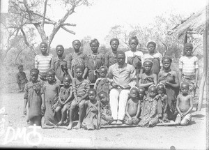 Man with a group of children, Africa, ca. 1896-1911