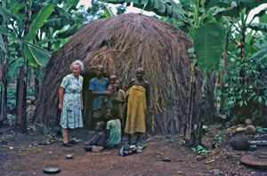 Nurse Ellen Margrethe Christensen. Here visiting a local village family. She served as missiona