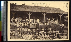 Missionary sisters with children in front of school, Madagascar, ca.1900-1930