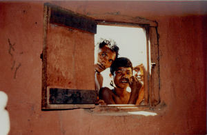 East Jeypore, Rayagada, India. Some curious locals watching what may happen at the Christian wo