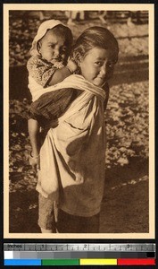 Girl carrying baby, Kārsiyāng, India, ca.1920-1940