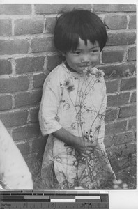 An orphan girl at Fushun, China, 1936