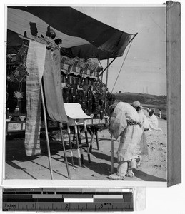 Sons bowing before spirit chair, Korea, ca. 1930-1950