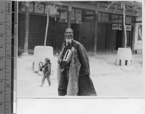 Man calling people to Moslem noon-day prayers, Ta Chia Tsz, Ningxia Huizu Zizhiqu, China, 1936