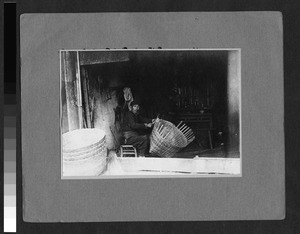 Man weaving a basket, China, ca. 1925-1930