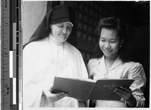 Sister Mary Aquinata, MM, with Legayce de Guzman, Malabon, Philippines, September 25, 1948